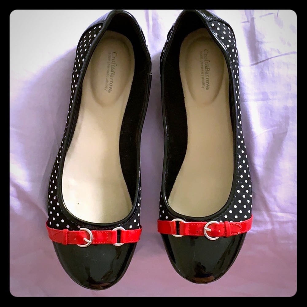 Black flats with white polka dots and red buckle